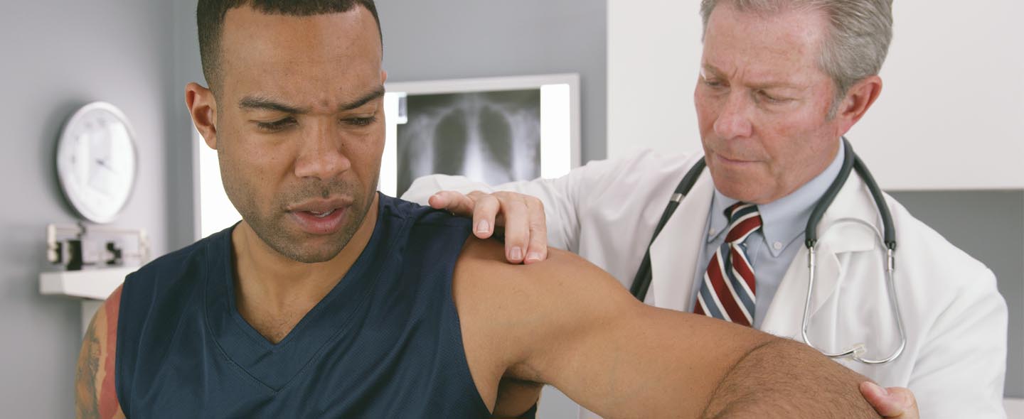 Athlete having a shoulder check up